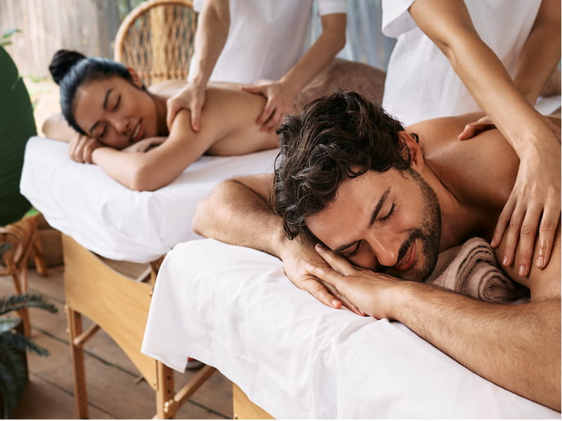 A relaxing scene of a couple experiencing a soothing massage in a spa in Siem Reap, after a day of temple exploriation