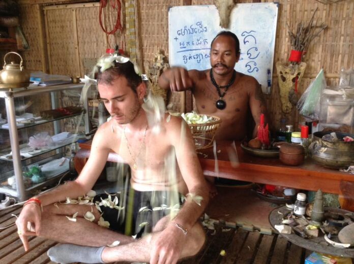 Tattoo Master Teven Say performs a Sak Yant blessing ritual